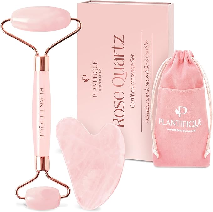Plantifique rose quartz facial massage set – roller, gua sha tool, pouch and box for skincare, circulation, and stress relief.