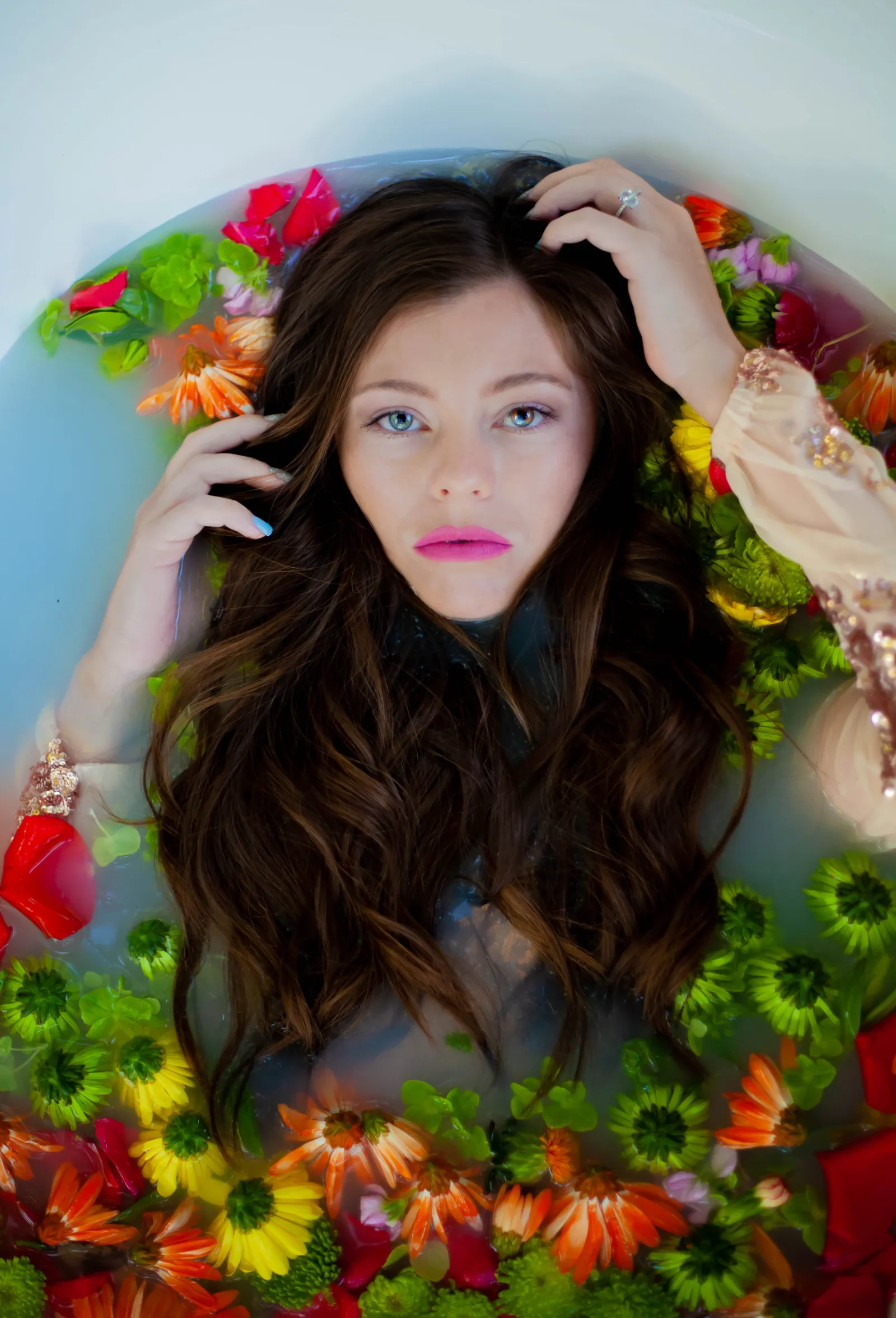 Editorial brand portrait with floral bath