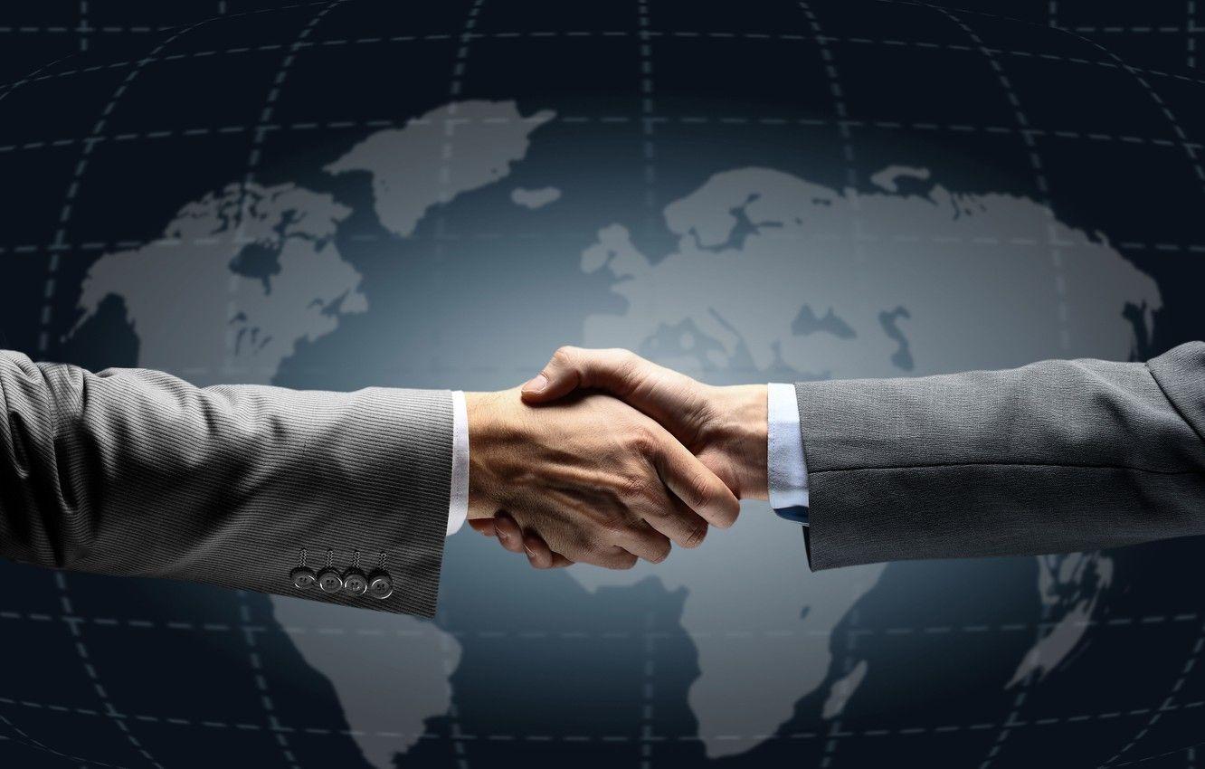 Business partnership handshake