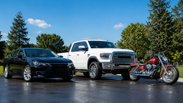 Multiple vehicle types including sedan truck and motorcycle after full professional detailing