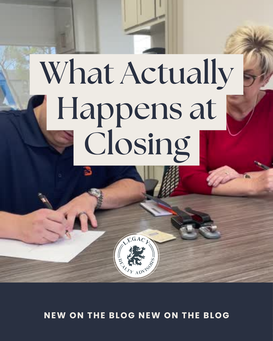 couple signing for Tulsa Home at the closing table at the Tulsa title company with Jennifer Mount, REALTOR®