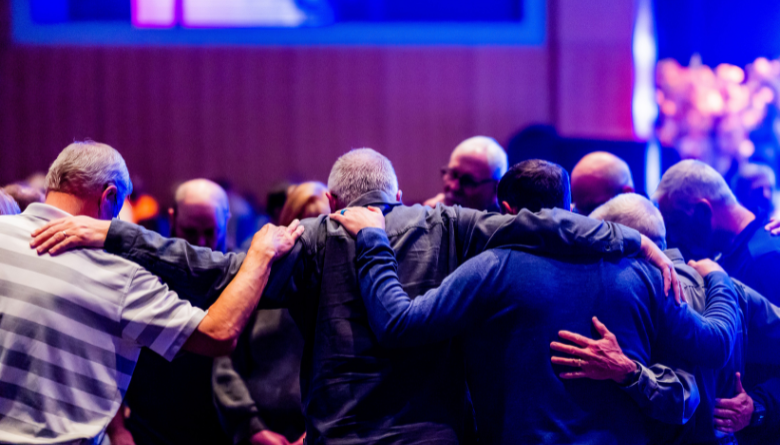 Steven Ray Hall speaking with men in a ministry setting, representing forty years of leadership and transformation" Steven Ray Hall speaking with men in a ministry setting, representing forty years of leadership and transformation"