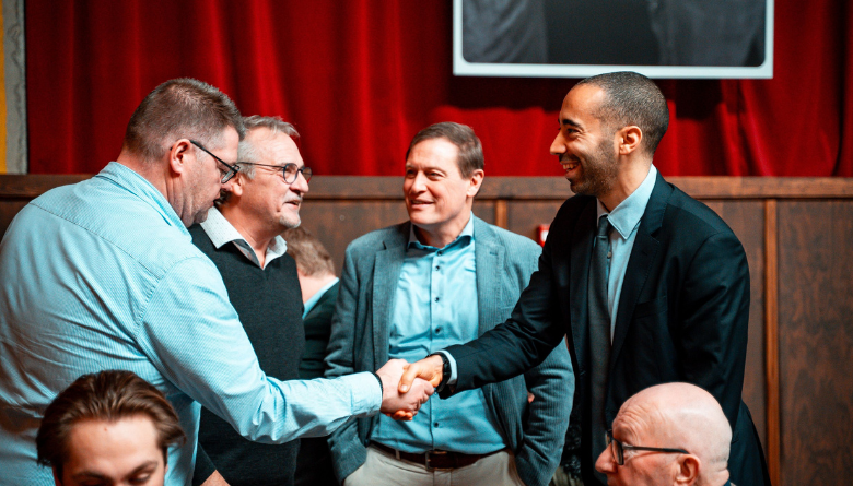 Group of men in a circle engaged in honest conversation about faith, purpose, and redemption Group of men in a circle engaged in honest conversation about faith, purpose, and redemption