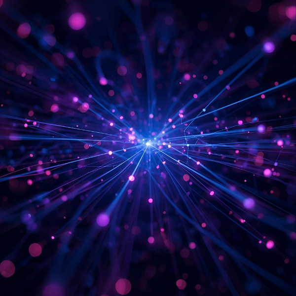 A vibrant burst of glowing blue and purple light trails with scattered particles radiating from a central point, creating an abstract futuristic energy or data flow effect.