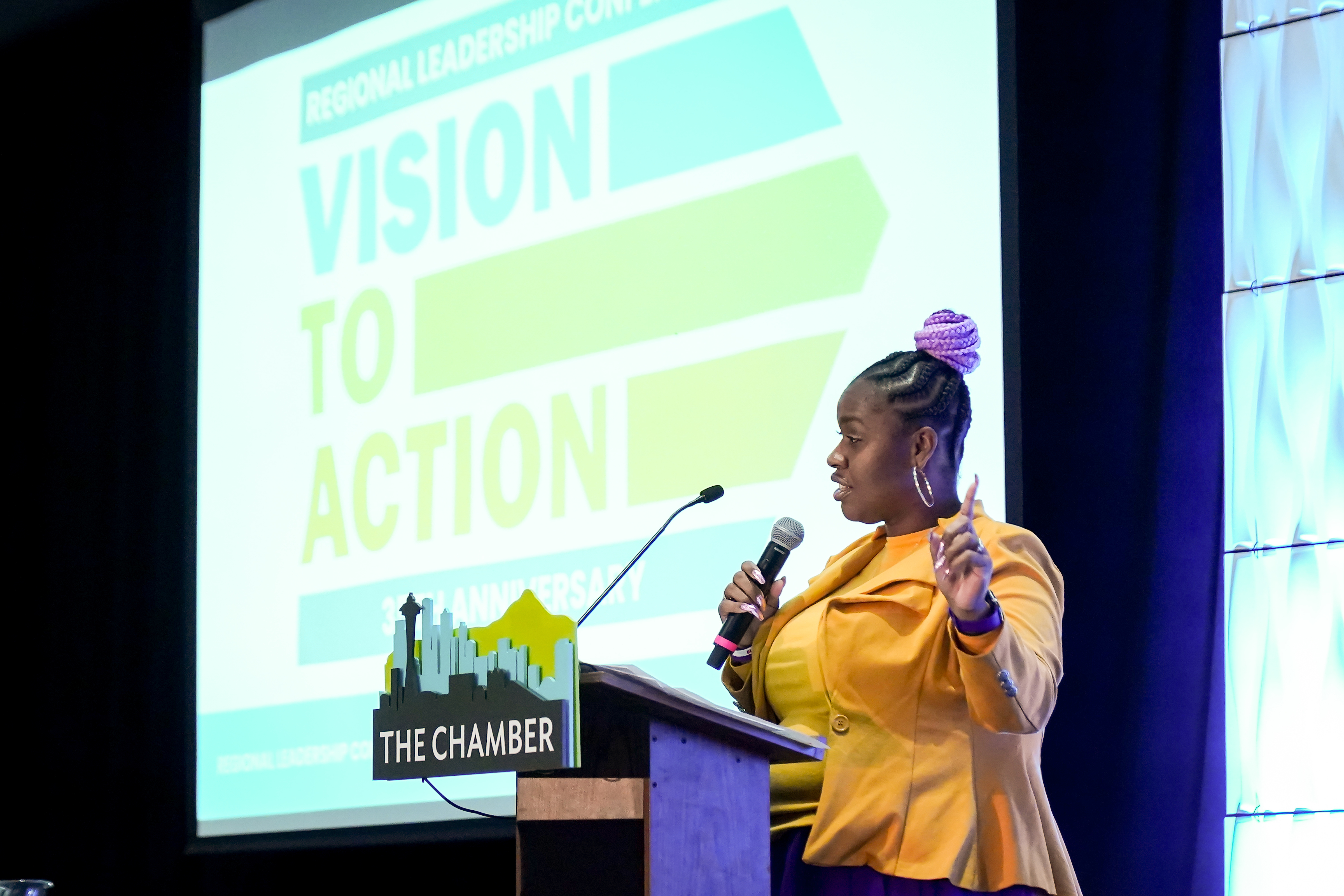 Margie Haywood speaking on stage