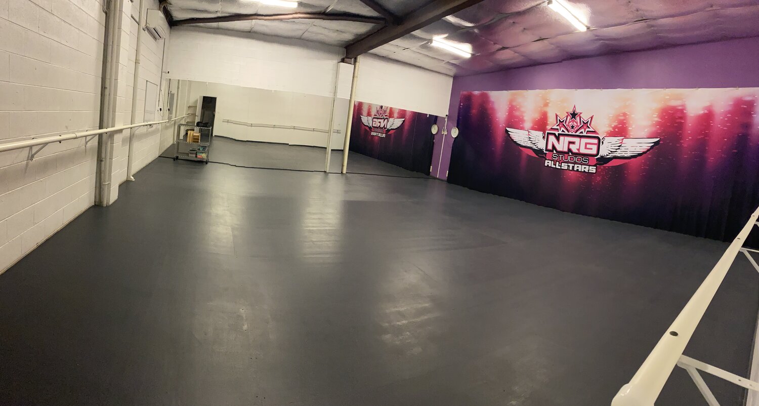 Main dance studio, Studio 1 at NRG Studios Allstars, featuring ballet barres and full-wall mirrors, purpose-built for dance classes in Wollongong