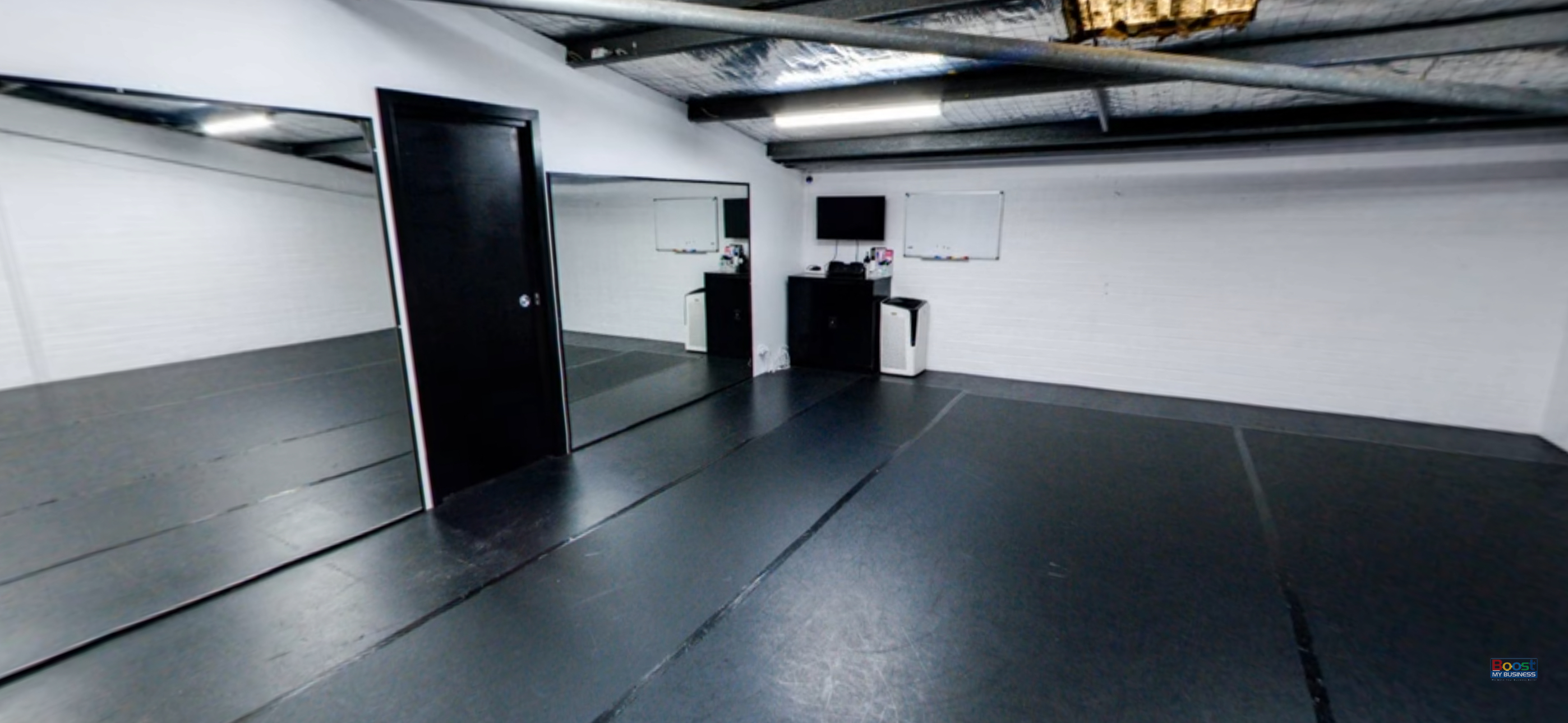 Second waiting room at NRG Studios Allstars in Wollongong, featuring a large space with an NRG photowall for kids to take fun photos