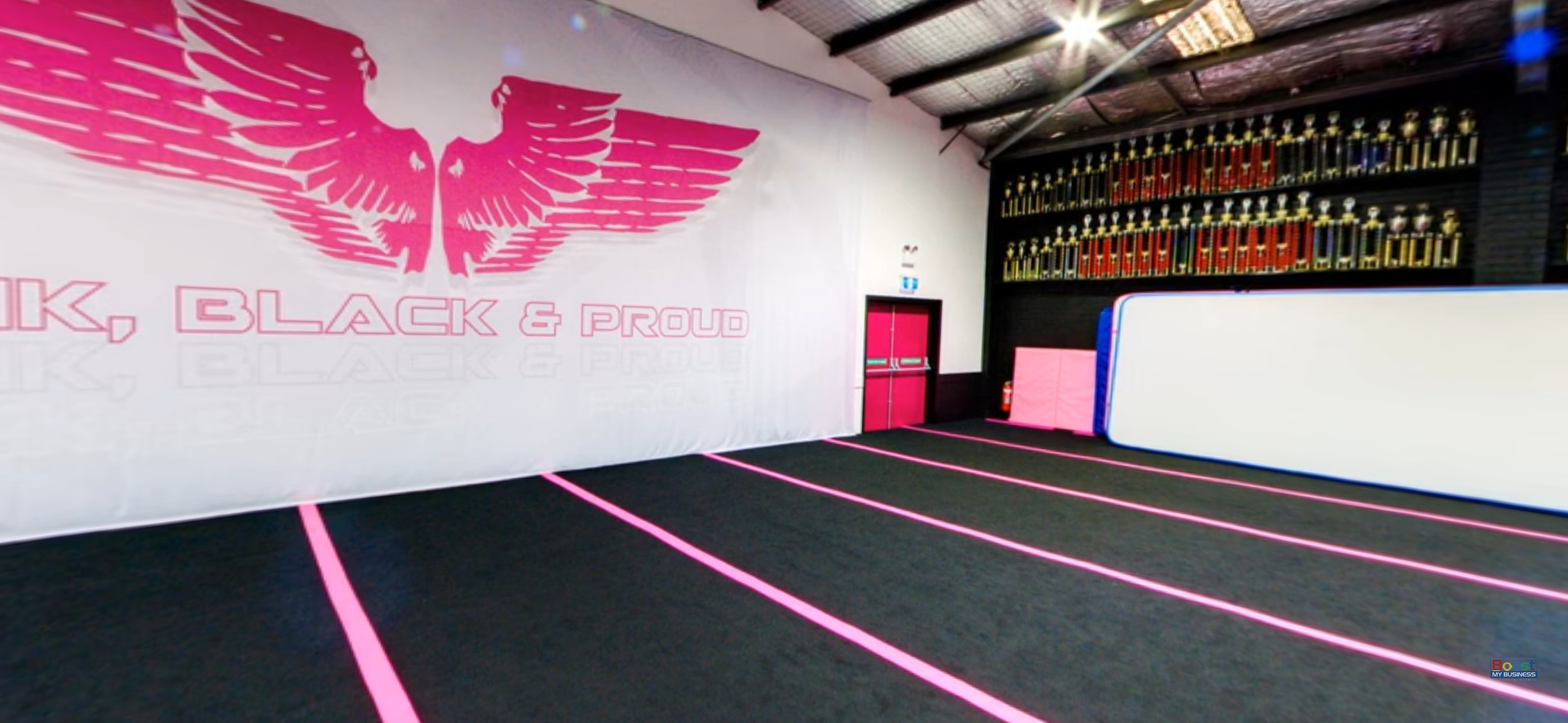 Second waiting room at NRG Studios Allstars in Wollongong, featuring a large space with an NRG photowall for kids to take fun photos