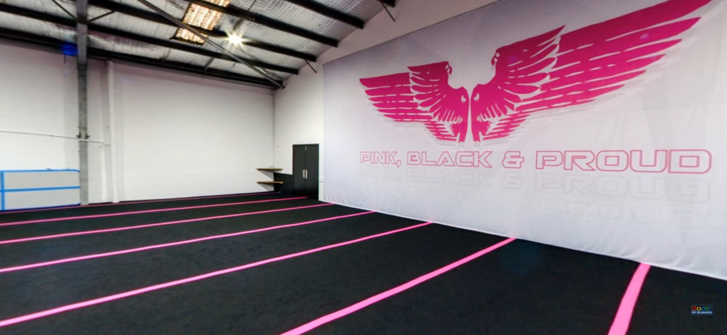 Main dance studio, Studio 1 at NRG Studios Allstars, featuring ballet barres and full-wall mirrors, purpose-built for dance classes in Wollongong