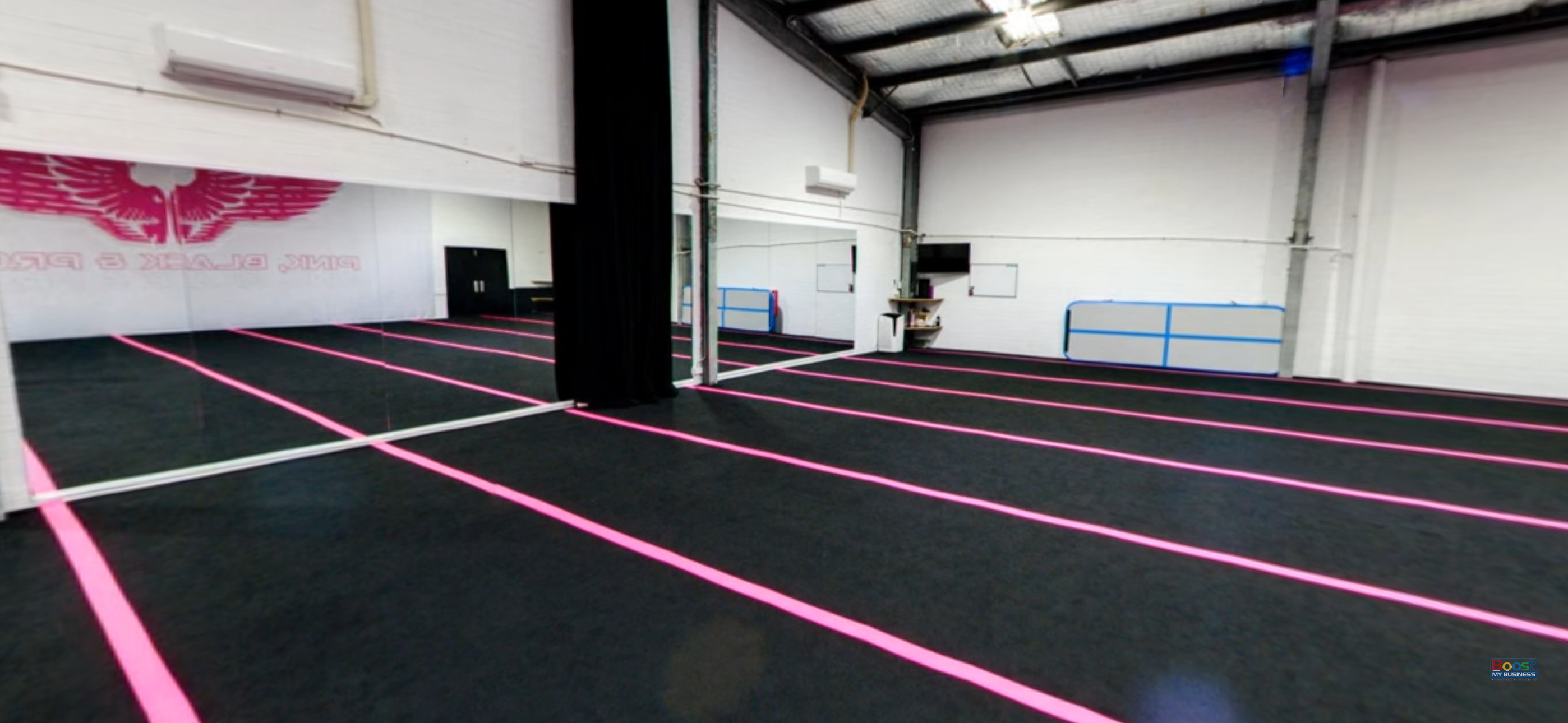 Main dance studio, Studio 1 at NRG Studios Allstars, featuring ballet barres and full-wall mirrors, purpose-built for dance classes in Wollongong