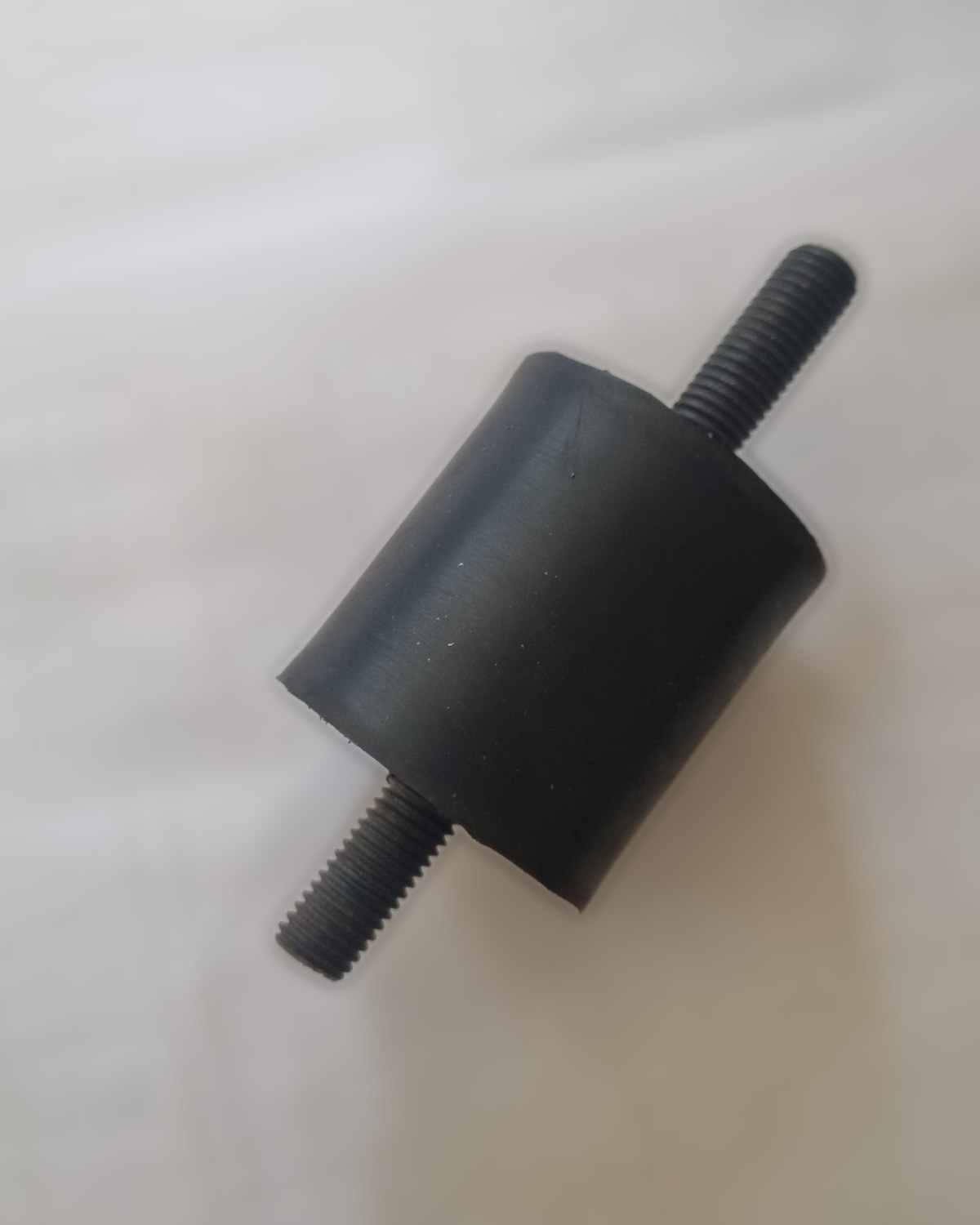 Rubber-to-metal mounting with threaded studs, made by Jedore Engineering