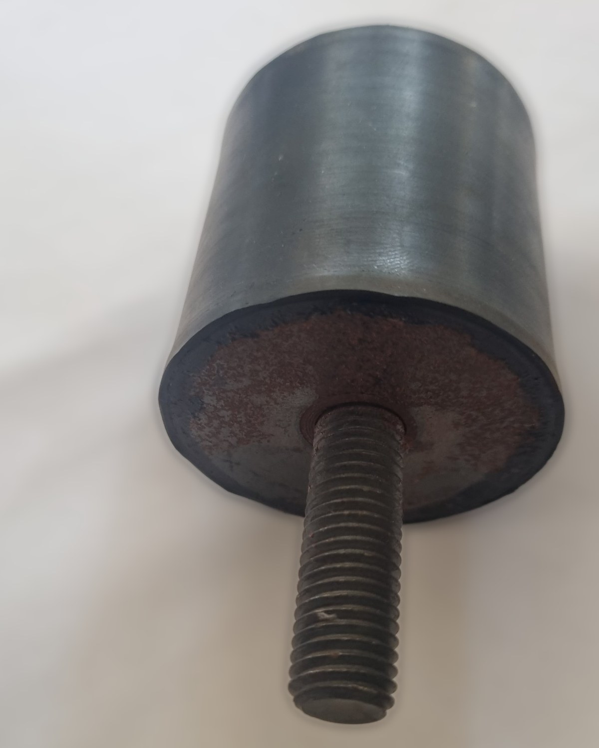 Rubber-to-metal mounting with threaded studs, made by Jedore Engineering