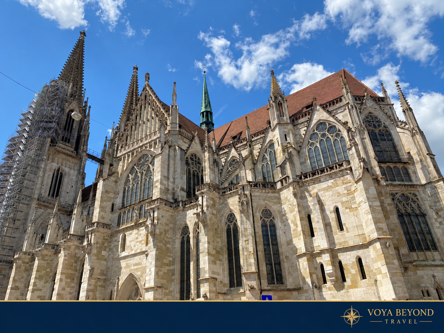 Gothic windows, buttresses and stonework on the south side of St. Peter’s Cathedral in Regensburg.