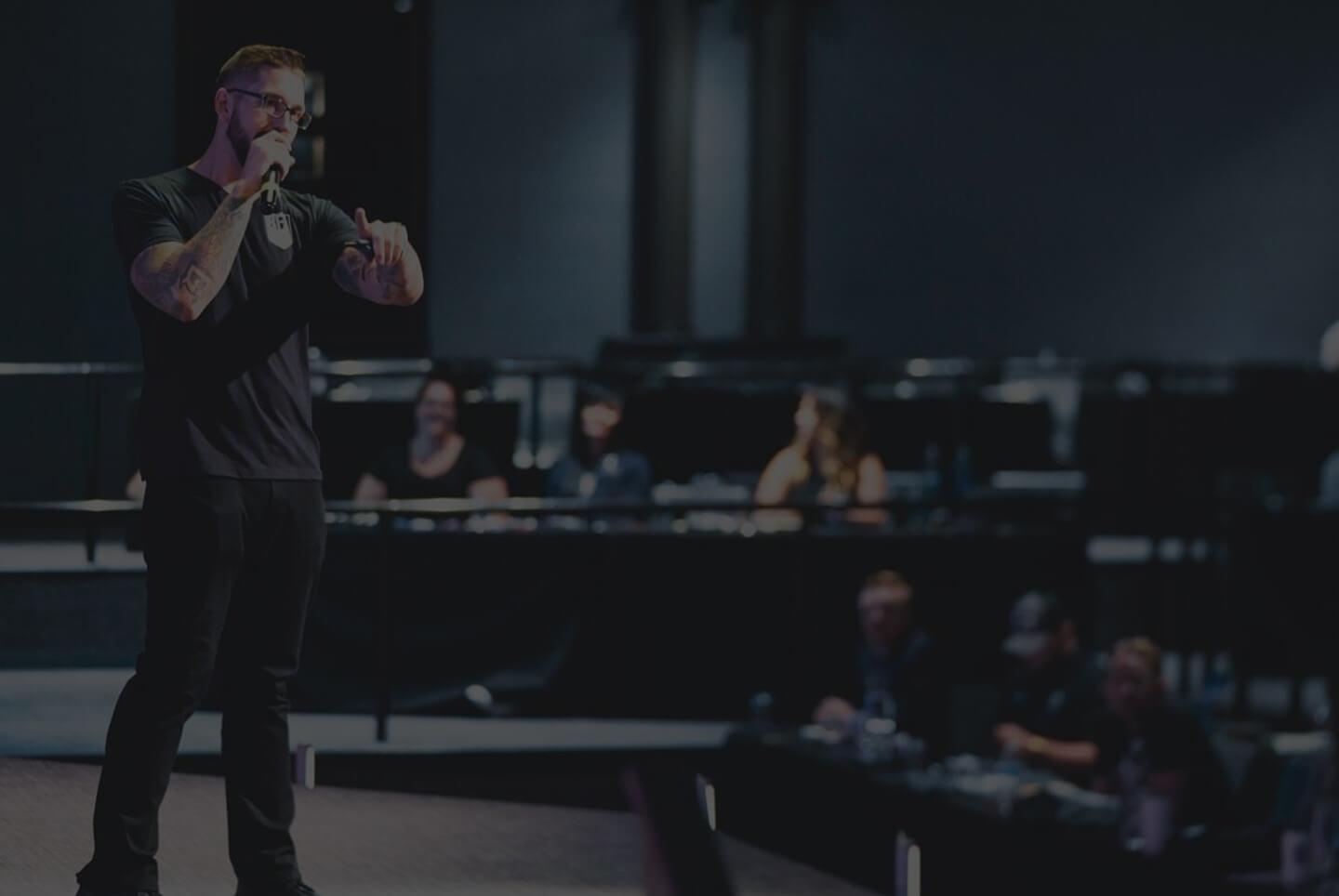Drewbie Wilson speaking to a corporate audience