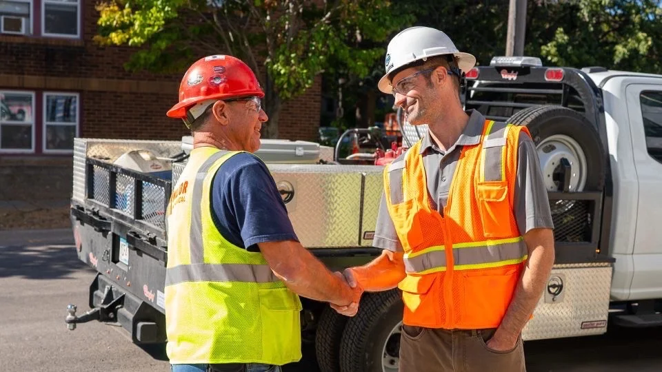Industry professionals in safety gear — representing the Minnesota contractors Kingdom Coaching serves