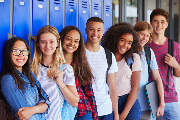 Photo of happy teens in a school setting