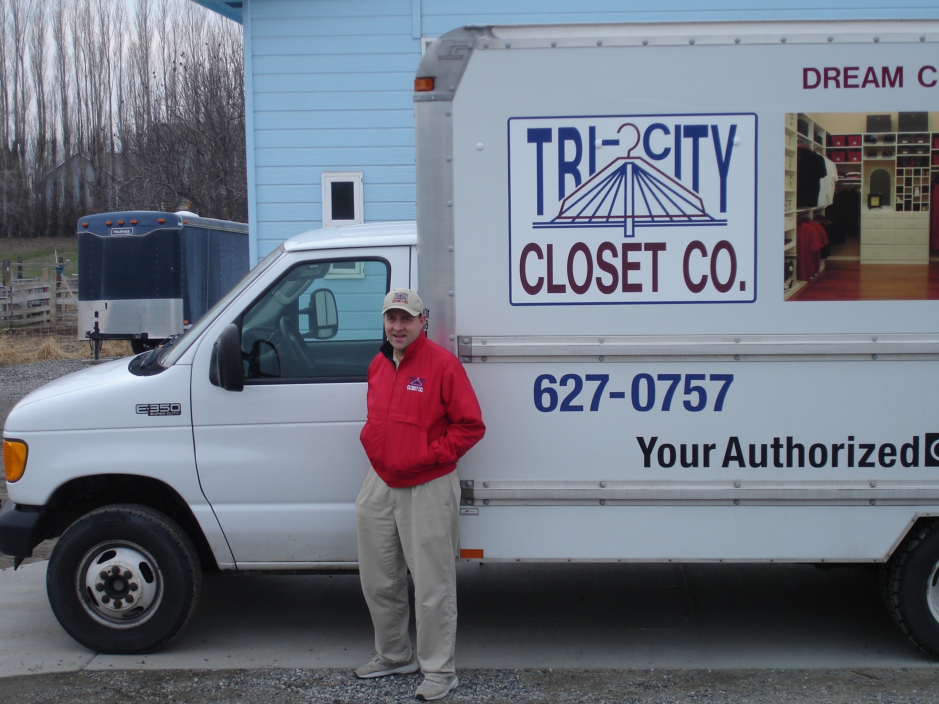 All City Closet Co. owner standing beside a company installation truck