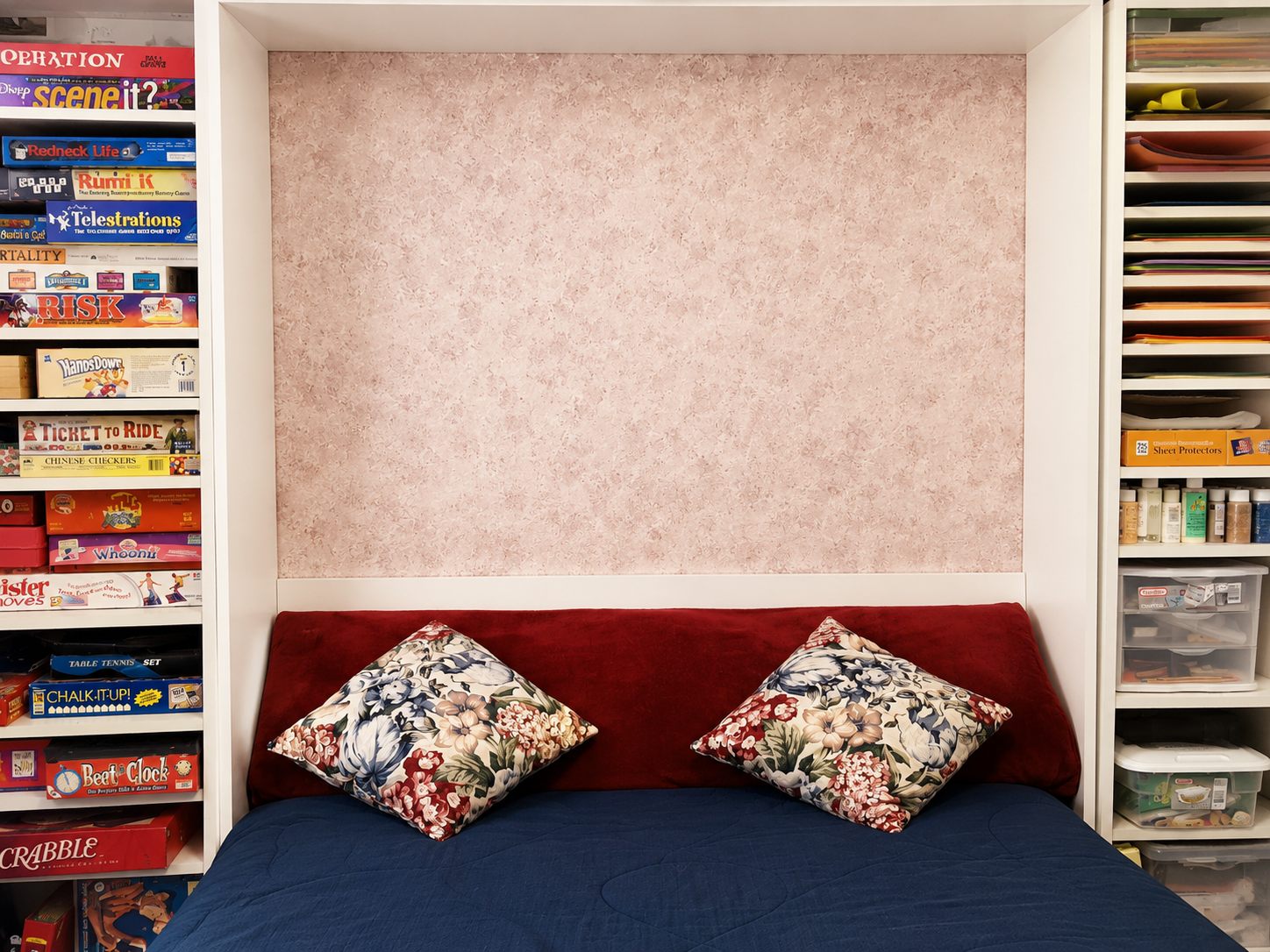 Murphy bed integrated with custom cabinetry and storage
