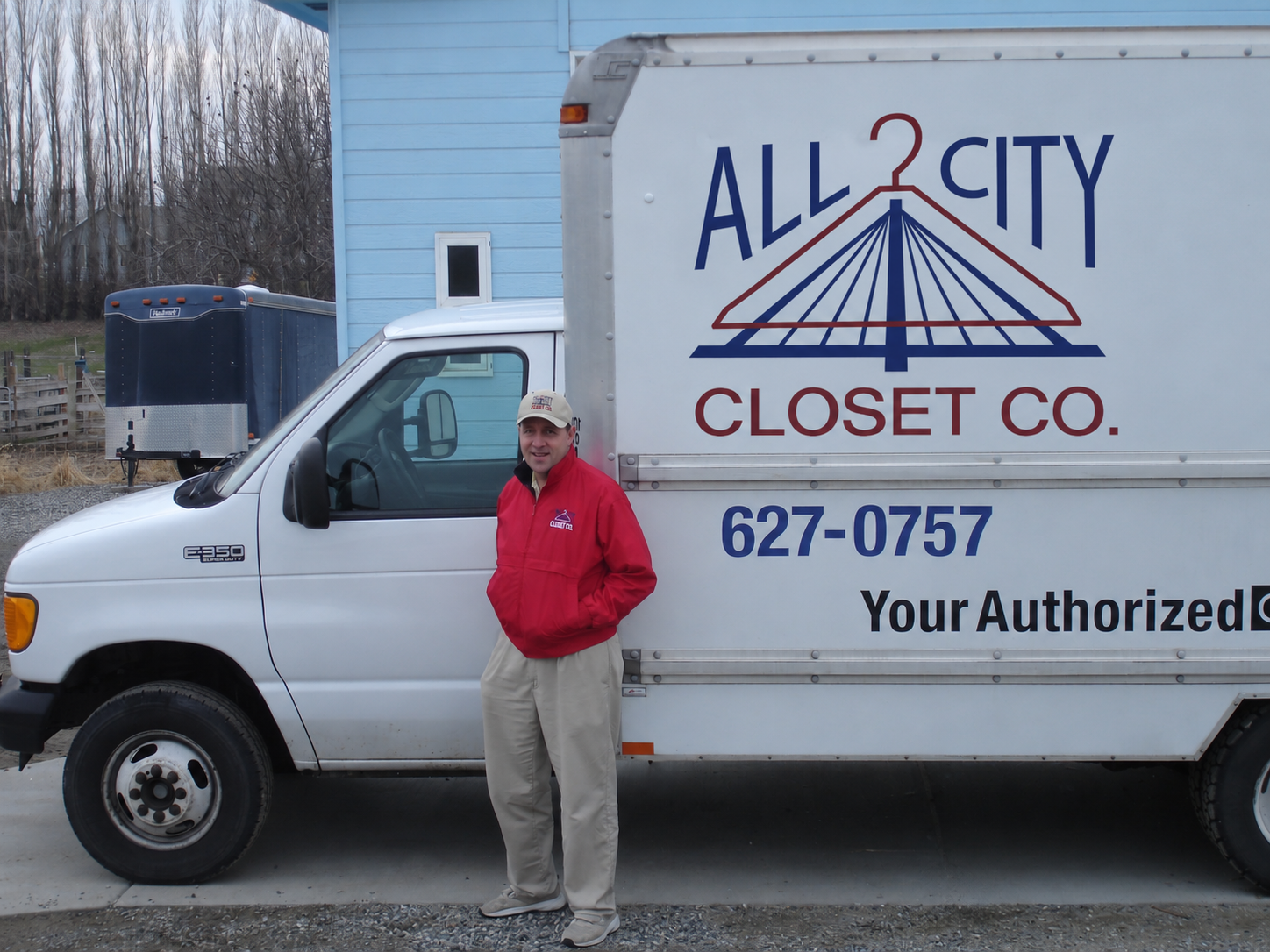 All City Closet Co. owner standing beside a company installation truck