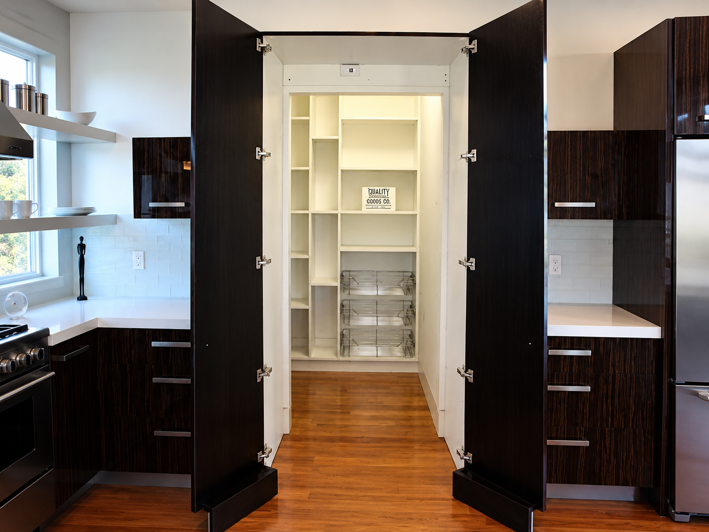 Custom pantry organization with shelving and cabinetry