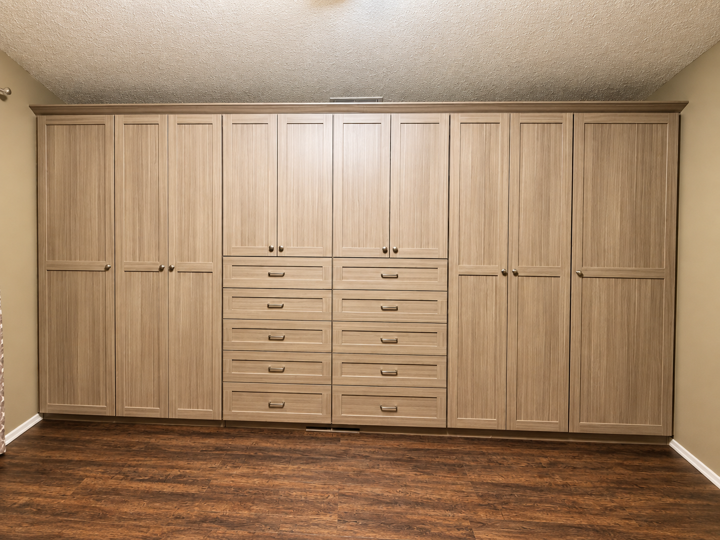 Custom built-in cabinetry with open display and concealed storage