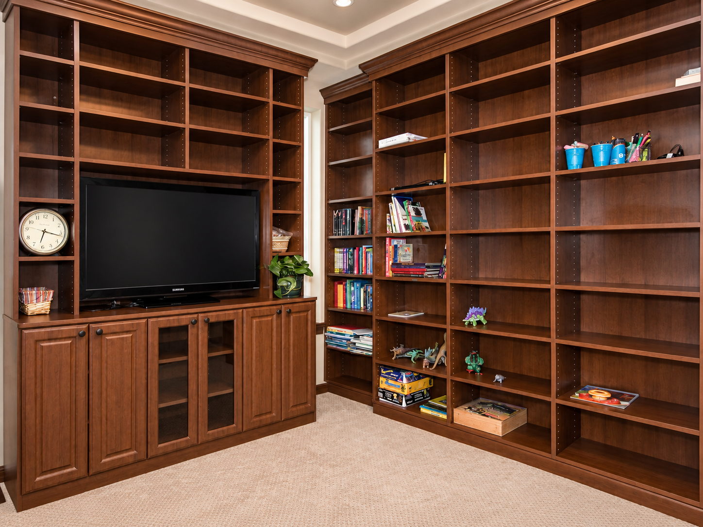 Custom media center by All City Closet Company