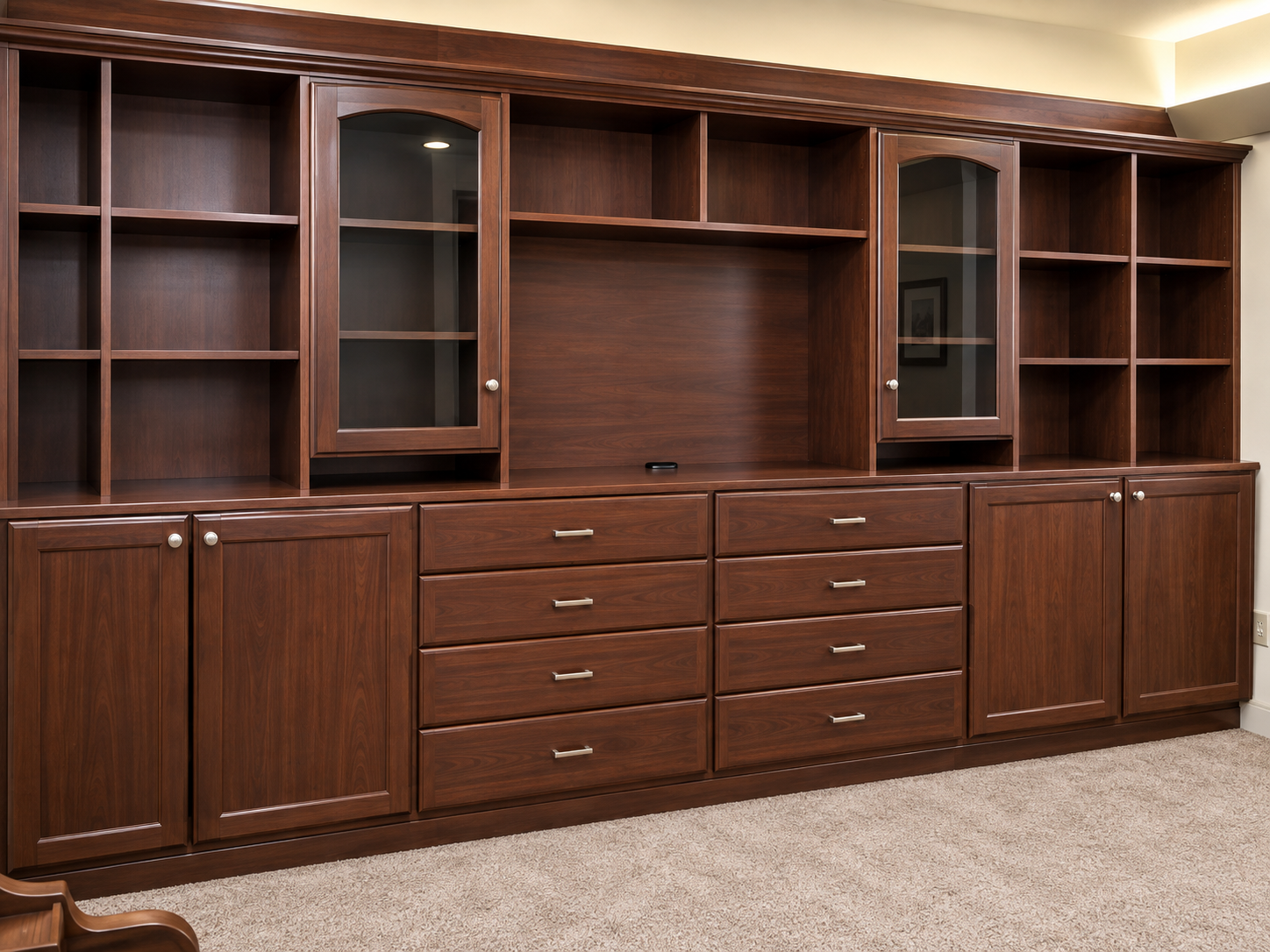 Custom media center with integrated cabinetry and shelving
