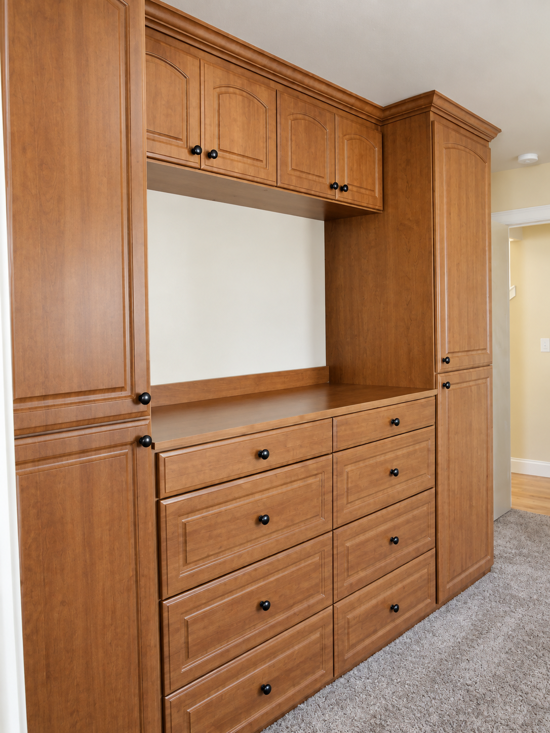 Custom media center fitted to the dimensions of the room