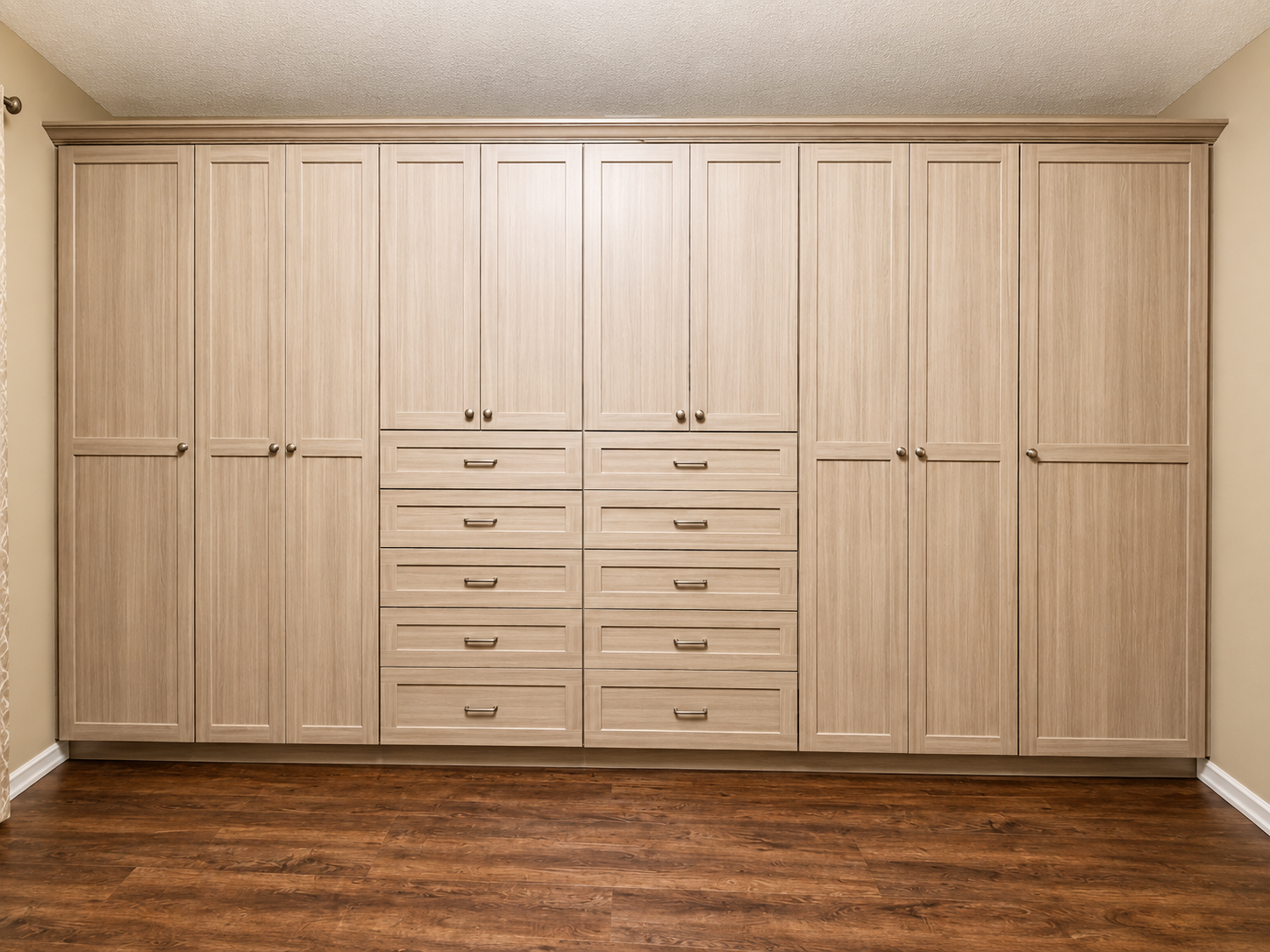 Organized reach-in closet with drawers shelves and shoe storage