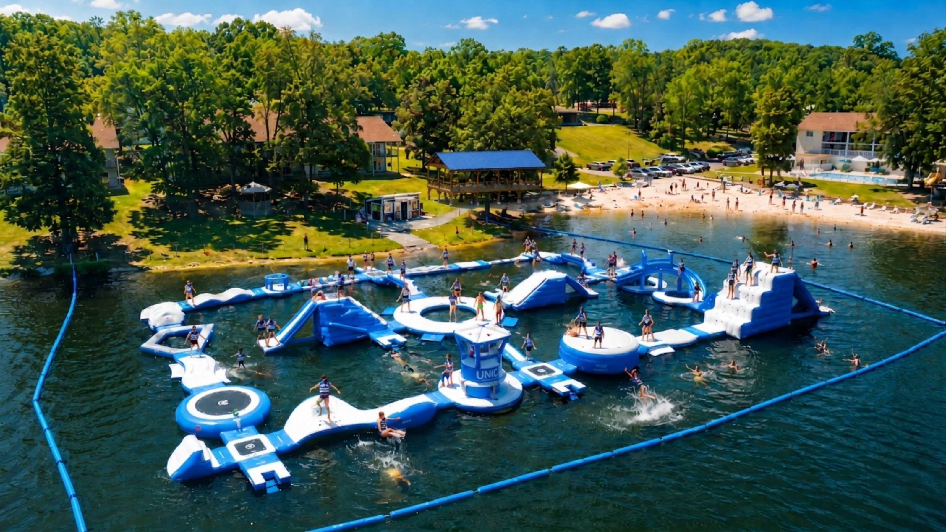 Aerial view of Crown Lake Aquapark — 37-piece inflatable obstacle course on Crown Lake in Horseshoe Bend, Arkansas