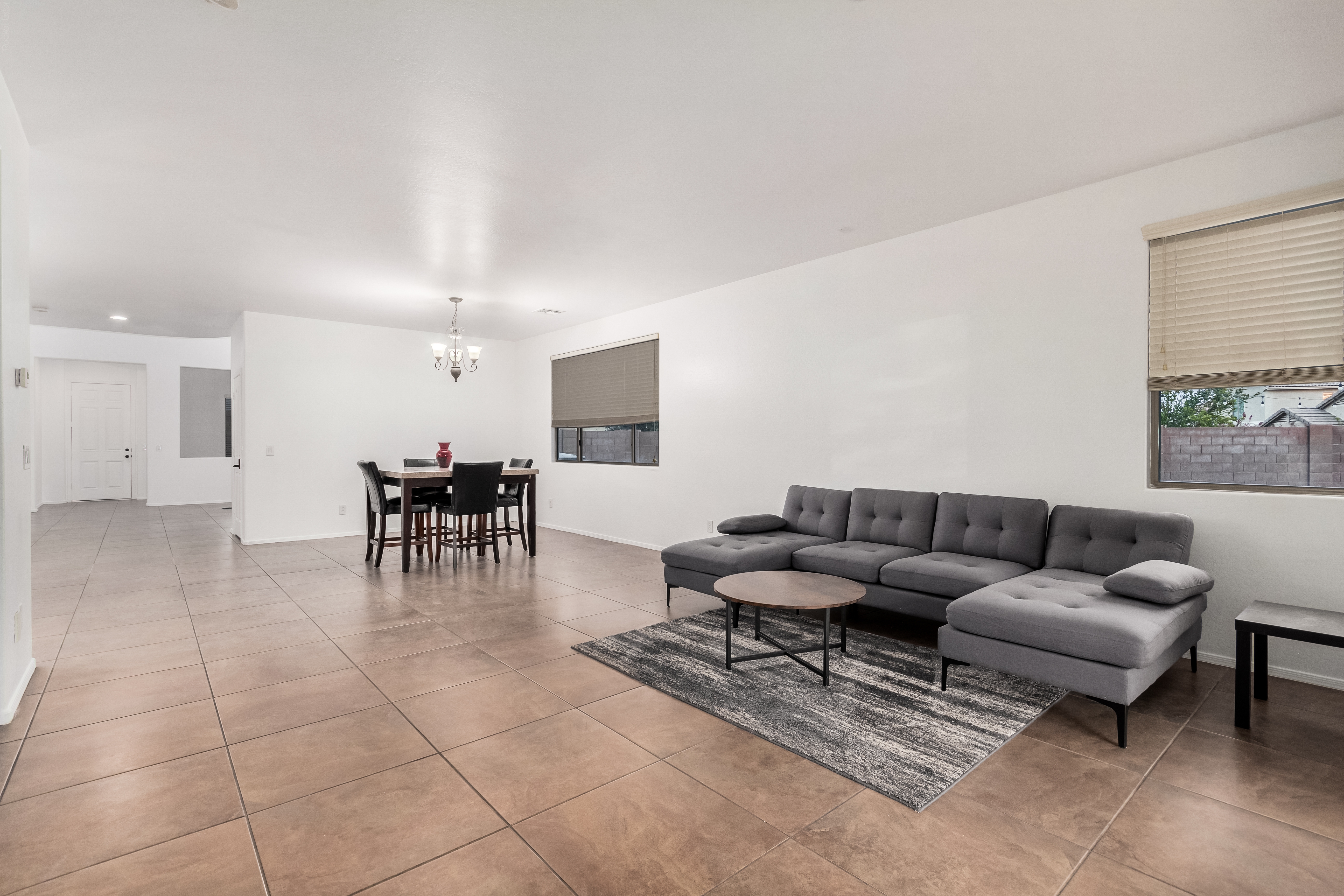 Open great room and main living area at 18663 W Vogel Ave Goodyear