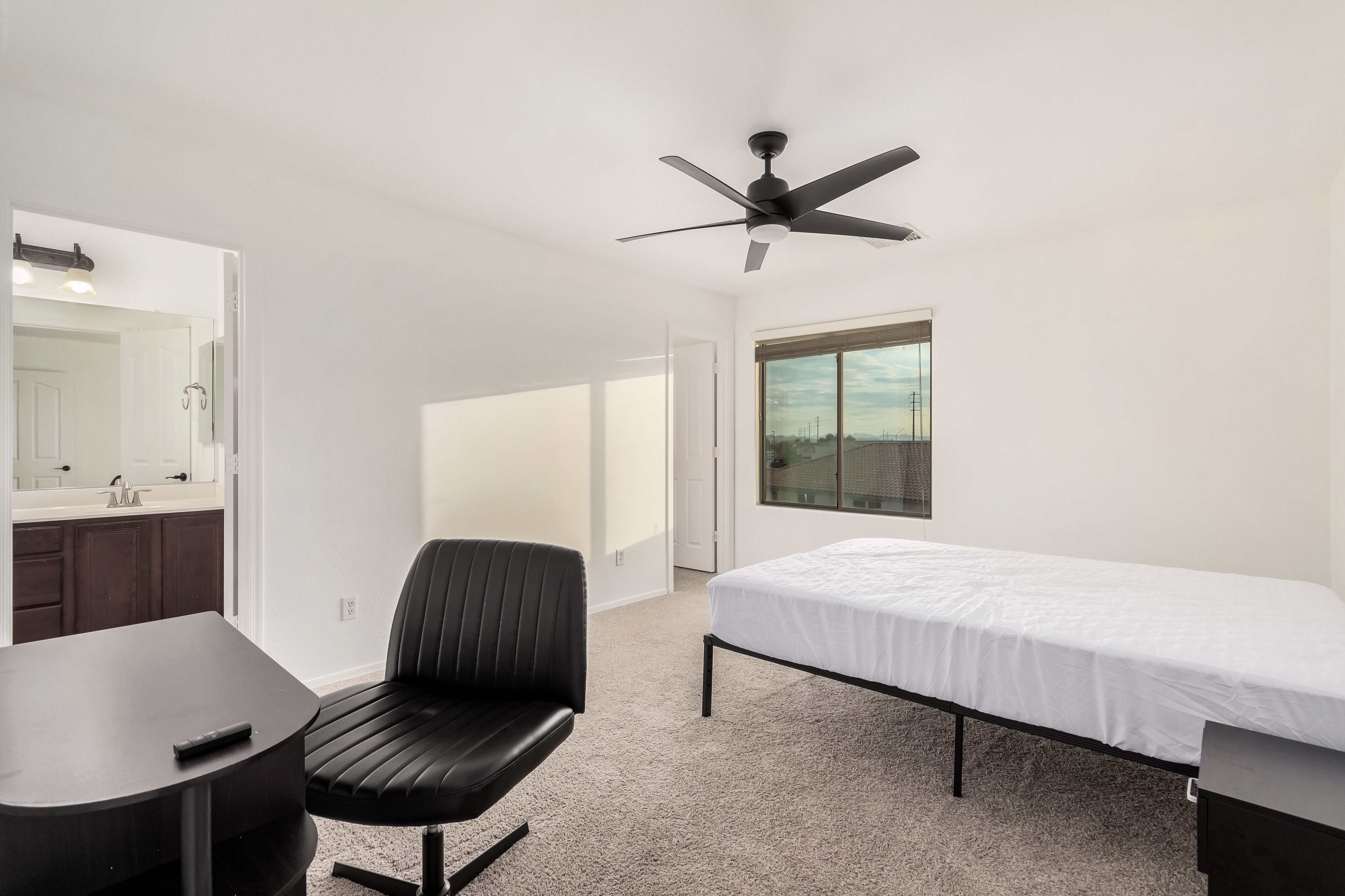 Walk-in closet and primary suite storage in Goodyear home