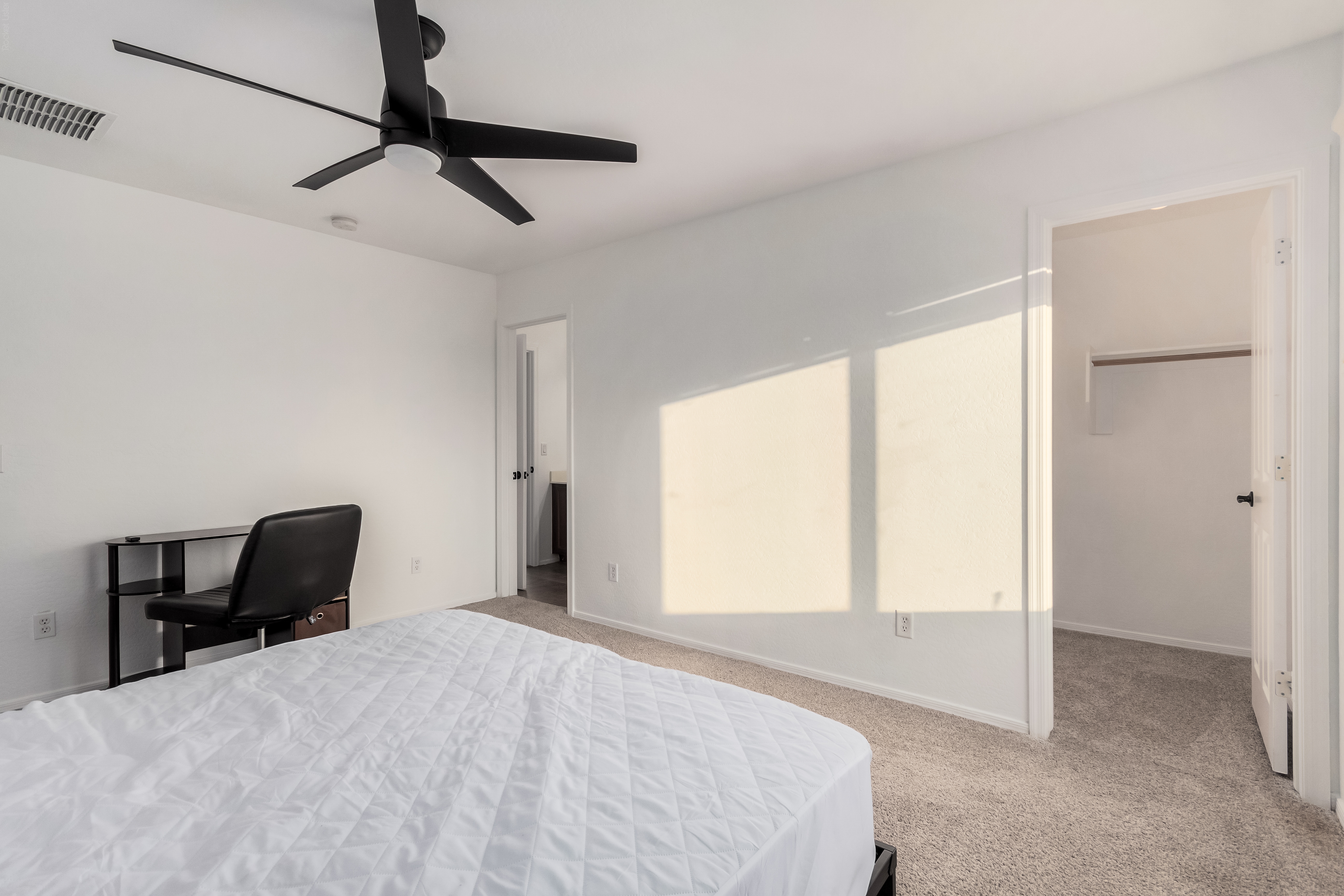 Upstairs bedroom in 5 bedroom Goodyear AZ family home for sale