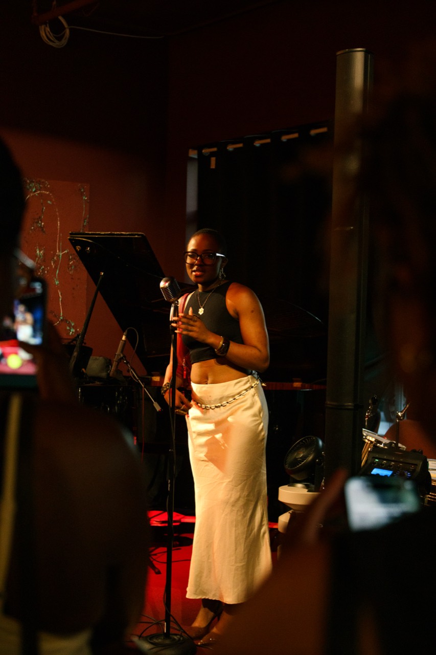 Live vocalist performing at Art in Motion
