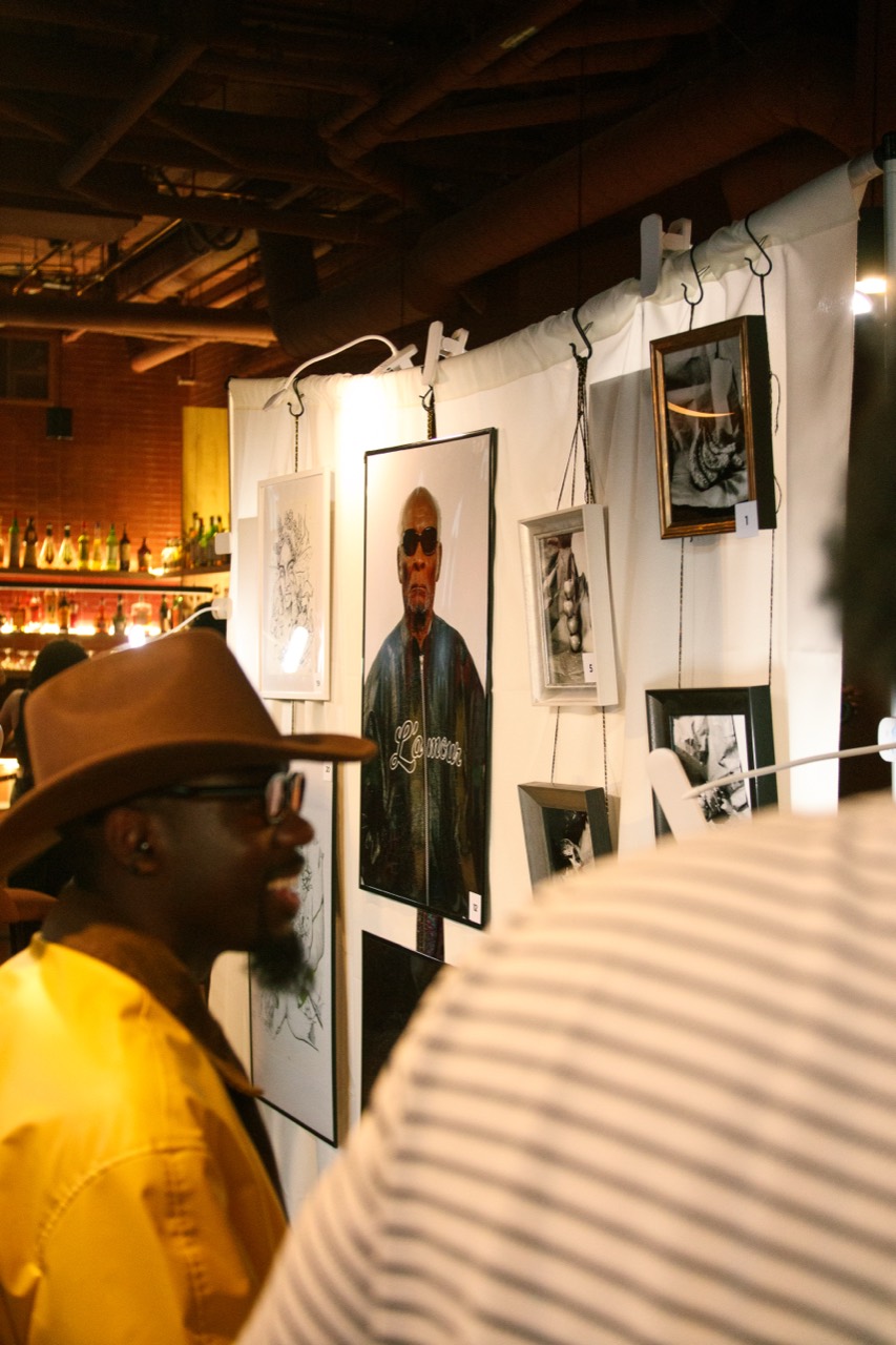Guests moving through the exhibition