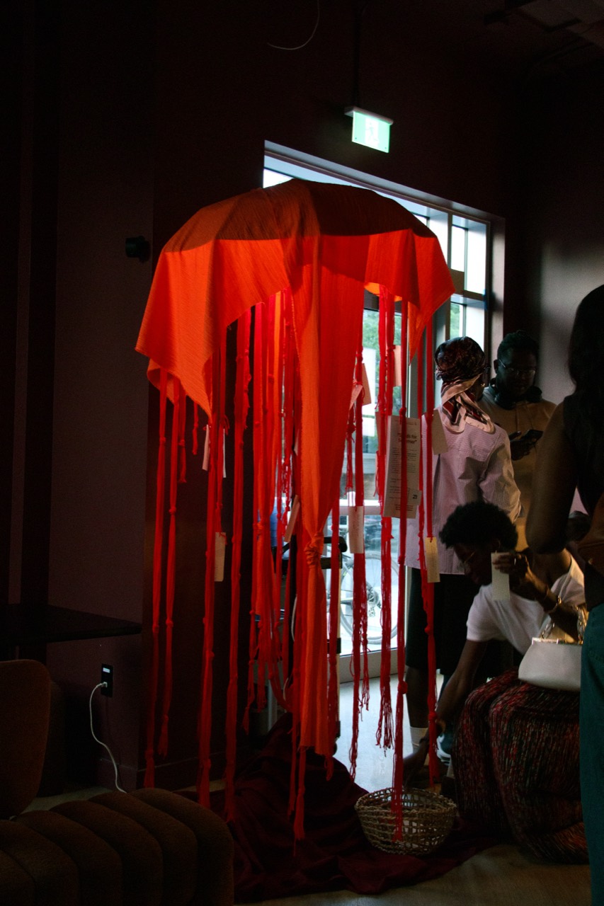 Red textile installation at Art in Motion