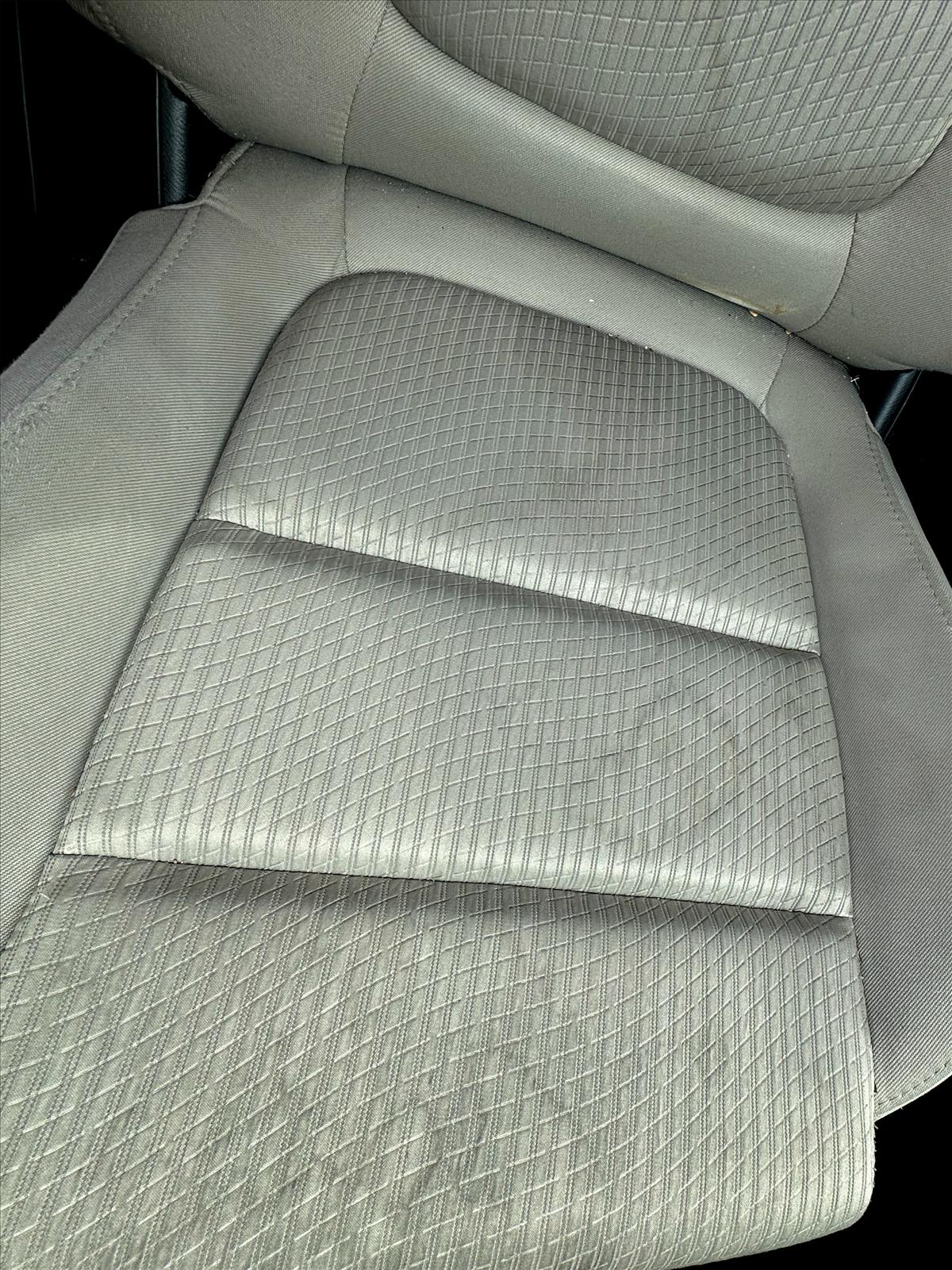 Car seat stains before treatment