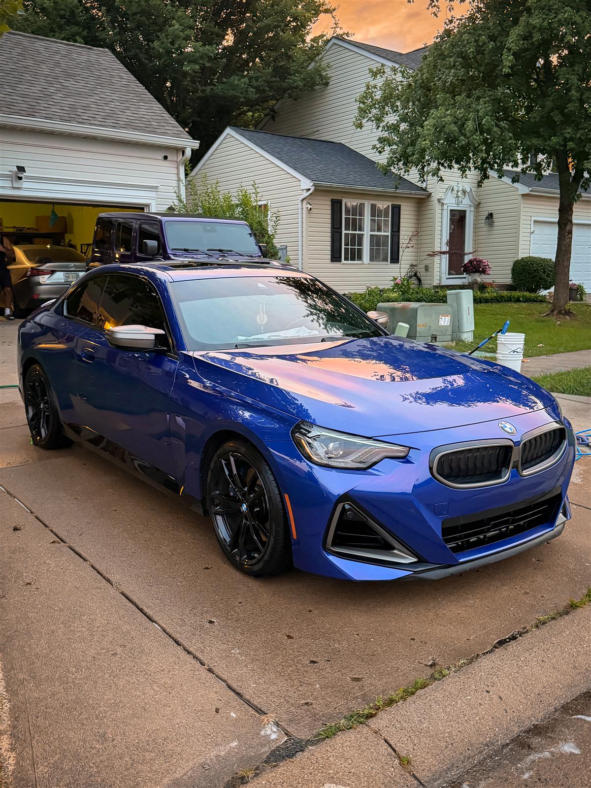 BMW M240i gleaming after a mobile detail