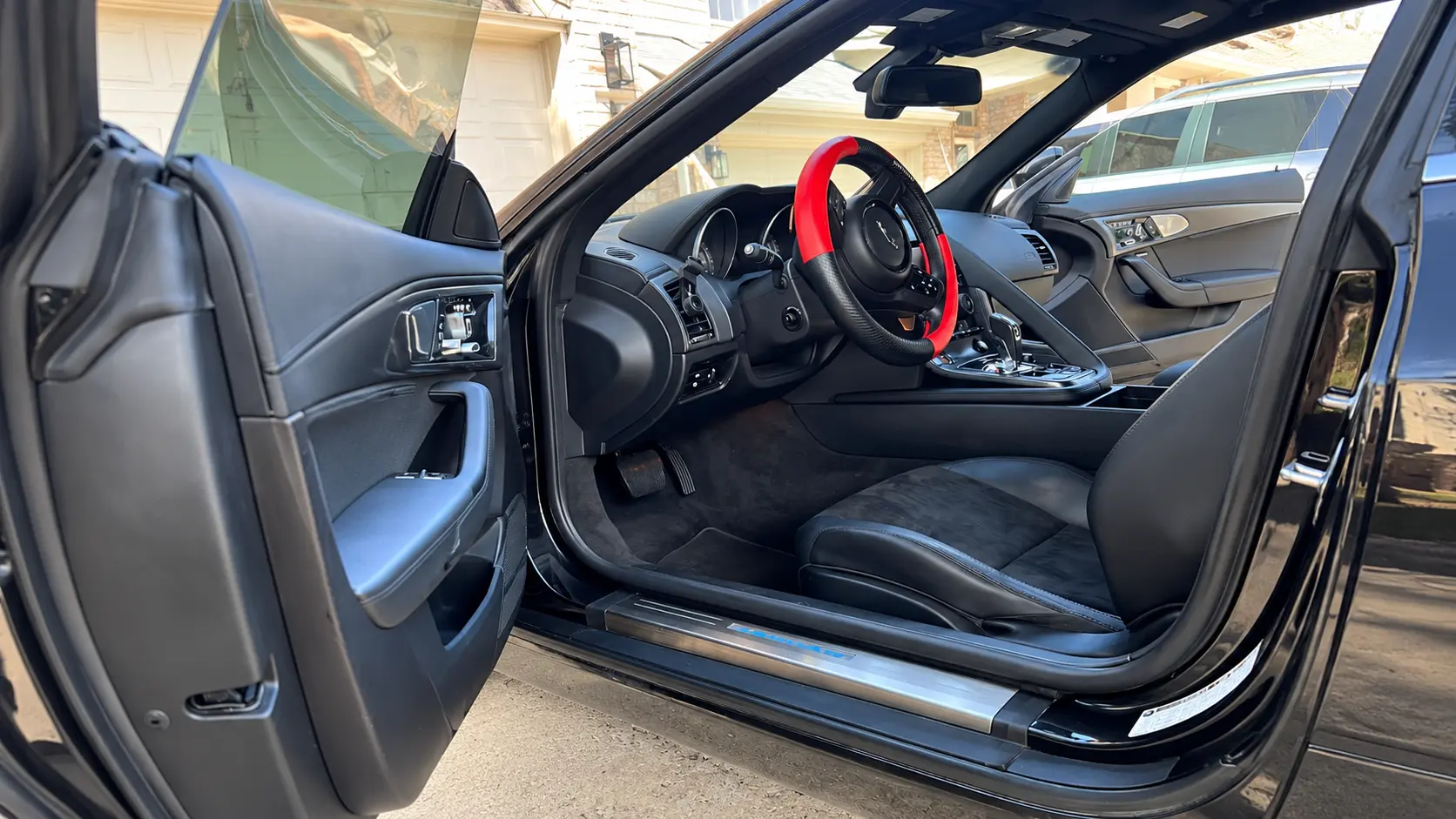 Conditioned seats and trim inside a detailed vehicle cabin