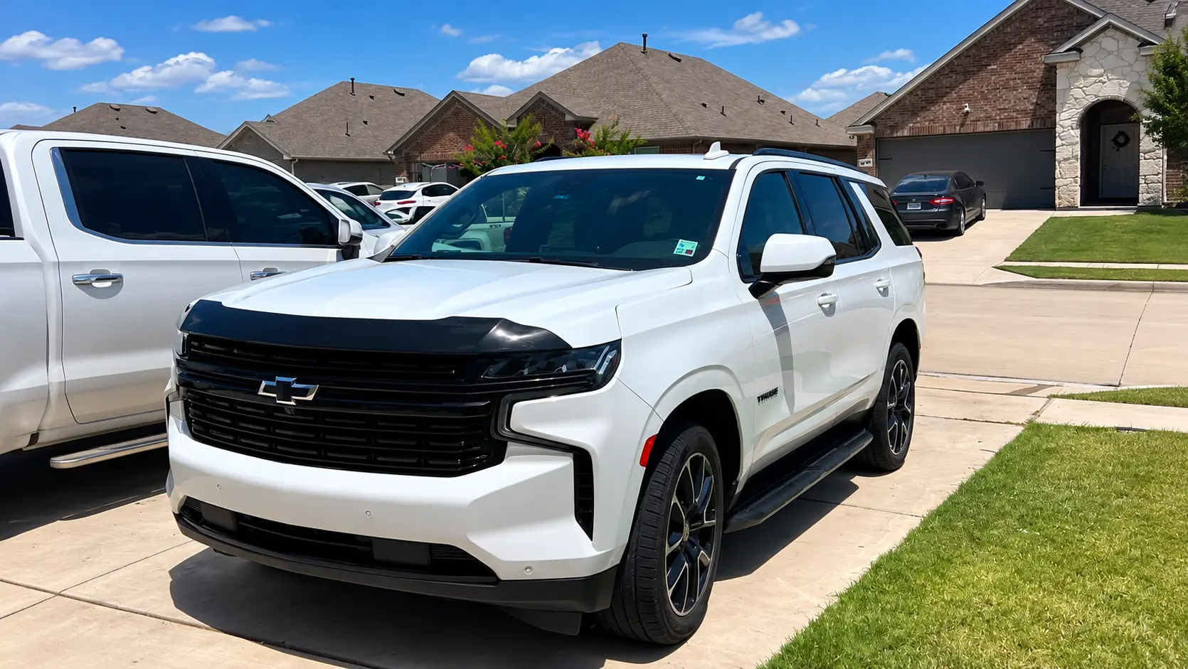 Freshly detailed vehicle parked in a Texas driveway