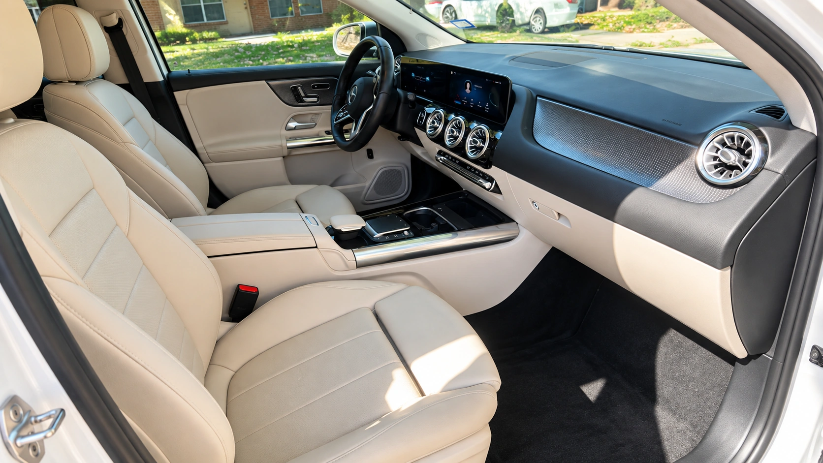 Pristine vehicle interior with clean seats and surfaces after detailing