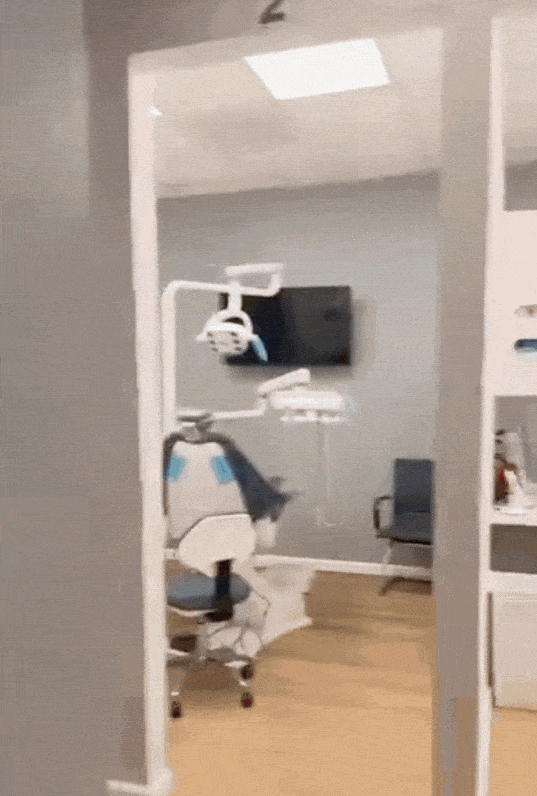 Dental treatment room with patient chair and equipment at Redlands Town Dental