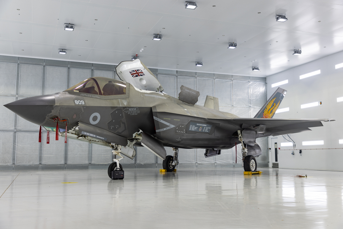 Military hangar with aircraft showing scale of engineering infrastructure