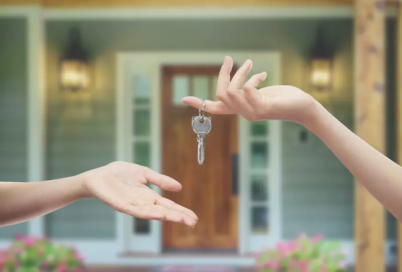 Signing closing documents for a new home