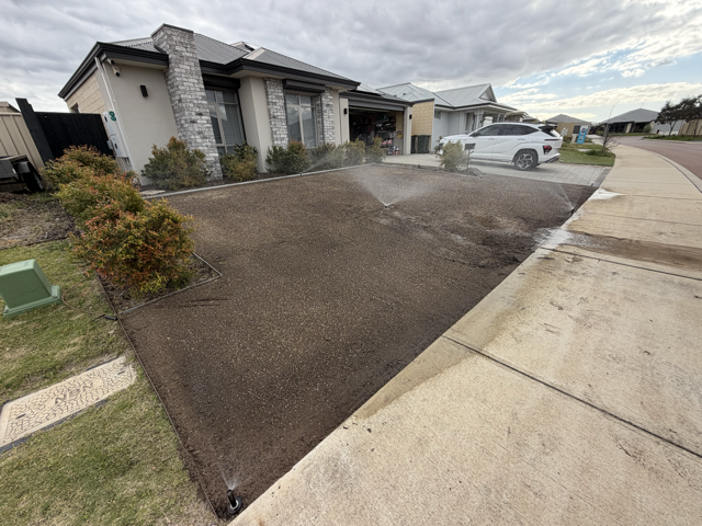 A lawn renovation in progress by Cotton's Mowing