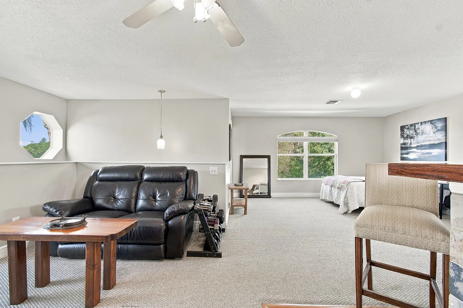 Upstairs bonus room, ideal for a game room, media room or additional family room with full bathroom at 3125 Ashmonte Dr, Land O Lakes FL