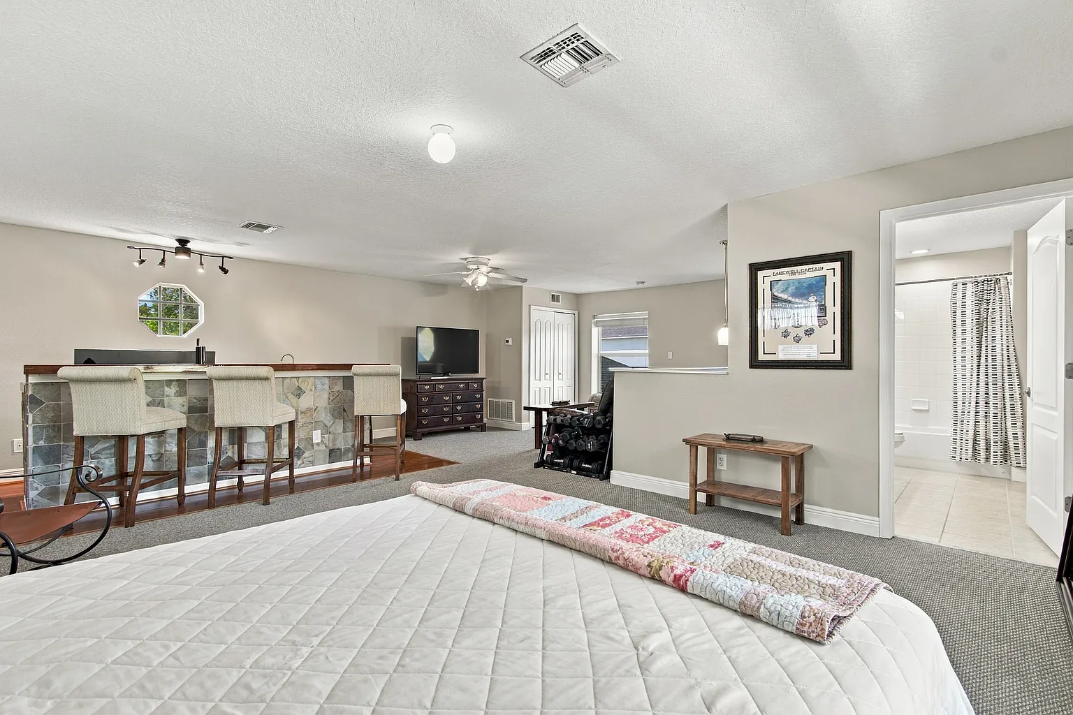 Upstairs bonus room, ideal for a game room, media room or additional family room with full bathroom at 3125 Ashmonte Dr, Land O Lakes FL