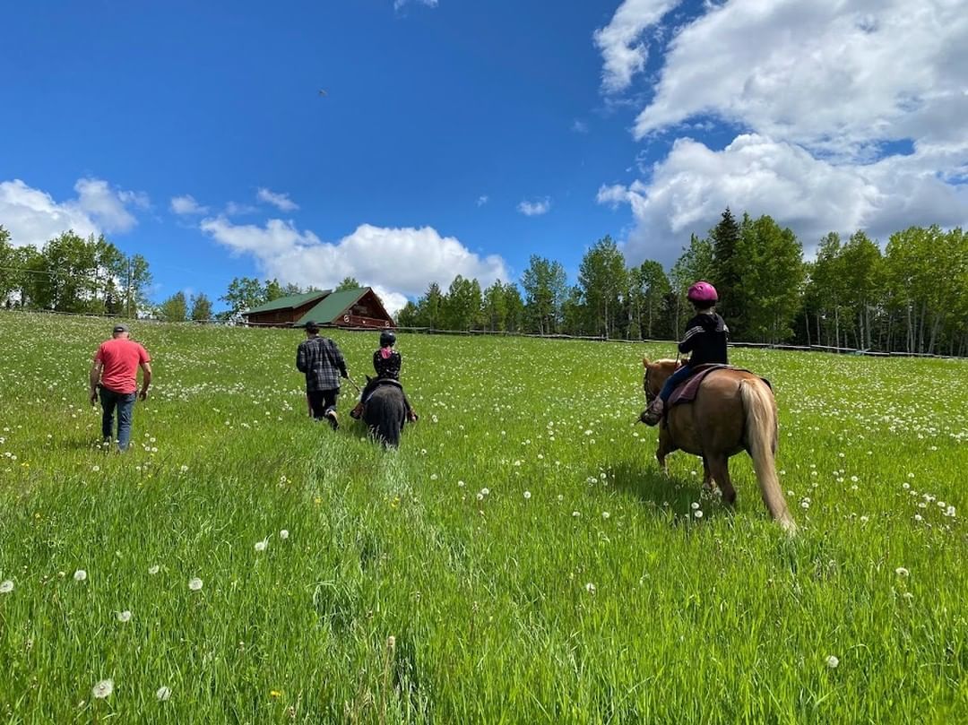 Horse back riding on dude ranch in Canada