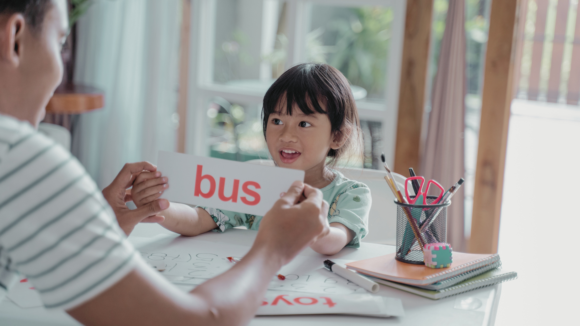 Dad and Daughter doing Phonics