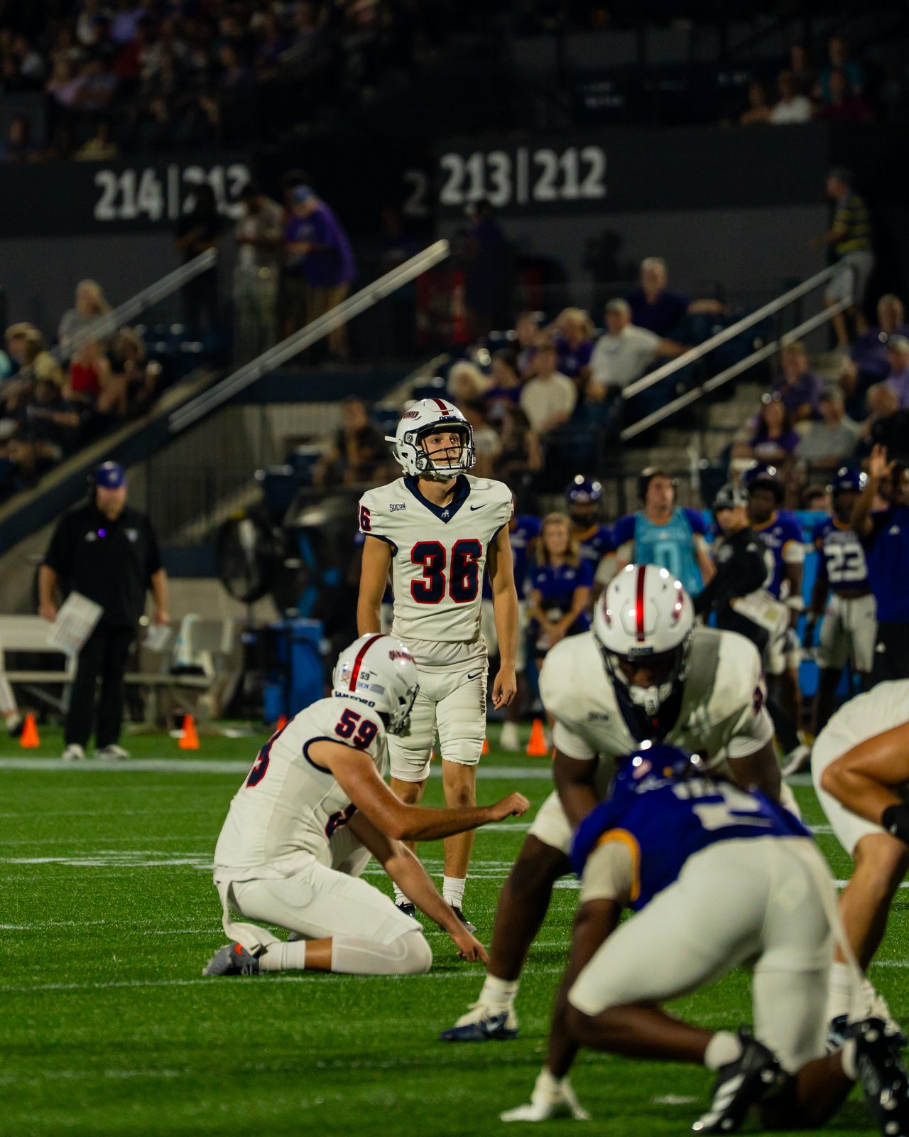 Ty Ippolito lining up a field goal in a Samford University away game